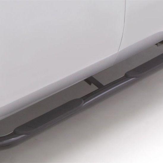 Lund 09-17 Dodge Ram 1500 Quad Cab 4in. Oval Curved Steel Nerf Bars - Black