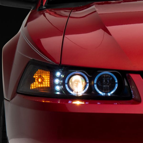 Raxiom 99-04 Ford Mustang Dual LED Halo Projector Headlights- Black Housing (Clear Lens)-Headlights-Raxiom-RAX101684-SMINKpower Performance Parts
