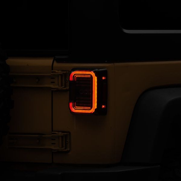 Raxiom 07-18 Jeep Wrangler JK Axial Series LED Halo Tail Lights- Black Housing (Dark Smoked Lens)-Tail Lights-Raxiom-RAXJ138358-SMINKpower Performance Parts