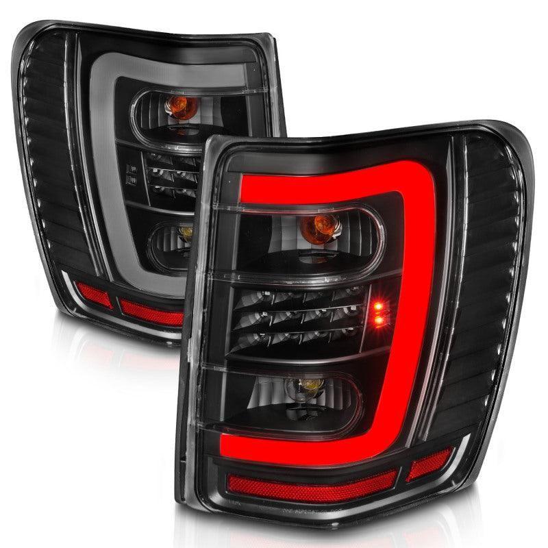 ANZO 1999-2004 Jeep Grand Cherokee LED Tail Lights w/ Light Bar Black Housing Clear Lens - SMINKpower Performance Parts ANZ311394 ANZO